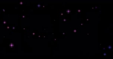 Parlayan yıldız Bokeh siyah arka planda uçuyor. Yıldız hareketli animasyon. Odaklanamayan etki. Yatay bileşim, 4k video kalitesi