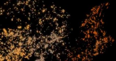Uçan soyut parçacıklar. Bokeh etkisi. Çok renkli parçacıklar siyah arkaplanda uçar. Yatay bileşim, 4k video kalitesi