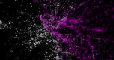 Uçan soyut parçacıklar. Bokeh etkisi. Çok renkli parçacıklar siyah arkaplanda uçar. Yatay bileşim, 4k video kalitesi