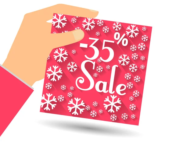 Winter sale. Discount 35 percent. Hand holds percent discount on the price. Gift card with a winter pattern with snowflakes in a flat style. — ストックベクタ