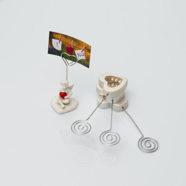 Fotoğraf-tutucu bir melek şeklinde aşkı hatırlatır