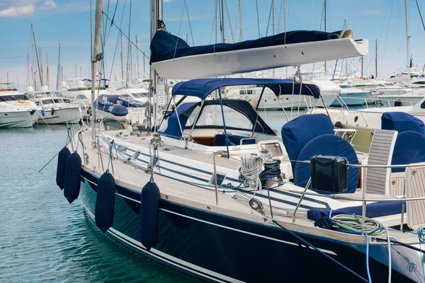 The Italian coast. Seaport. Motor boat and yacht moored in the port — Stock Photo, Image