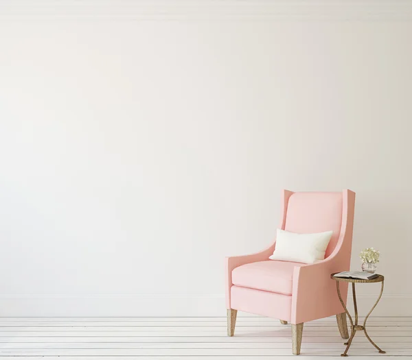 Fauteuil rose près du mur blanc — Photo