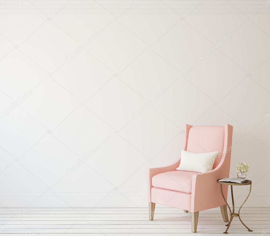 pink armchair near white wall 74090439