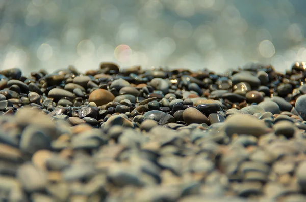 Kövek Kavicsokat a tengerparton — Stock Fotó