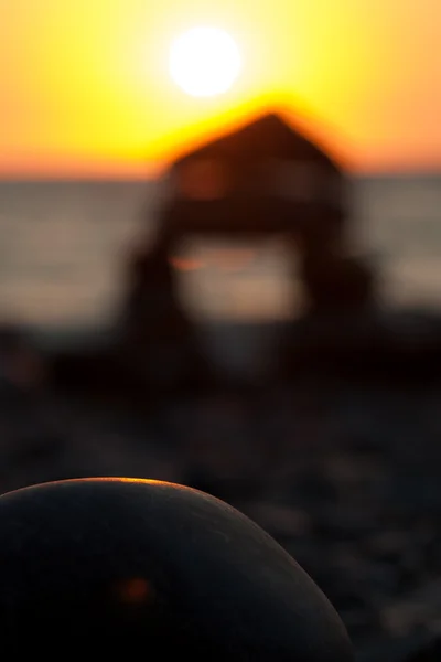 Pedras do mar ao pôr do sol — Fotografia de Stock