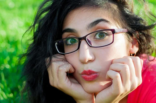 Girl with glasses in the park — Stock Photo, Image