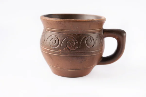 Beautiful old cup made ??of clay with patterns — Stock Photo, Image