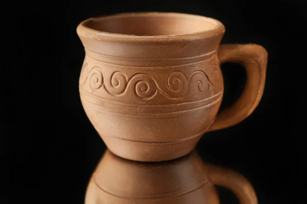 Beautiful old cup made ??of clay with patterns — Stock Photo, Image