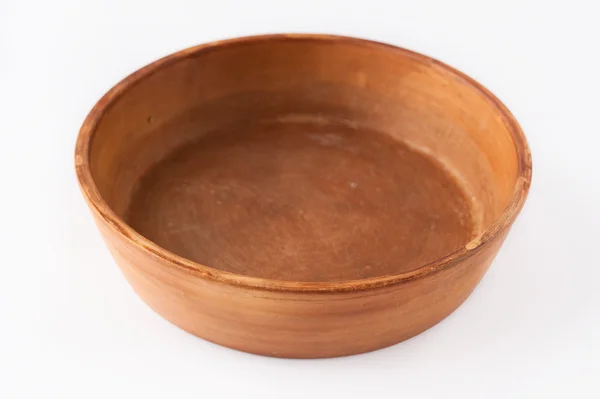 Beautiful old baking dish made ??of clay with patterns — Stock Photo, Image