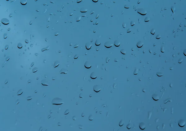 raindrops on glass pane