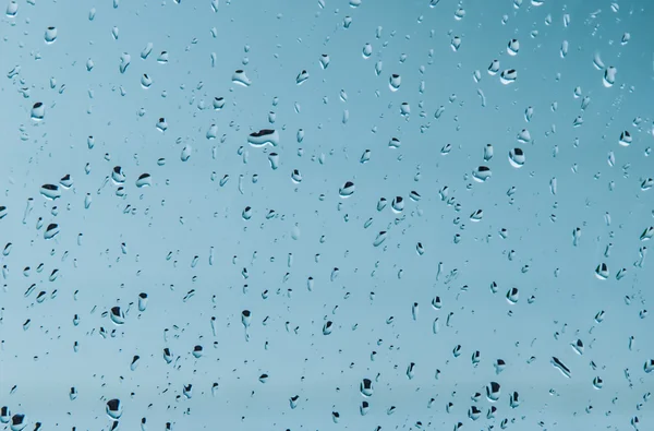 raindrops on glass pane