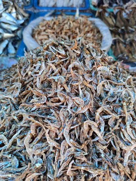 Dry Fish,dried shrimp or dry kardi fish or dried prawns arranged in the market for selling.