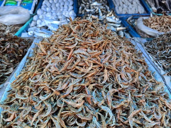 Dry Fish,dried shrimp or dry kardi fish or dried prawns arranged in the market for selling.
