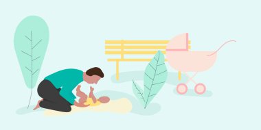 Baba ve oğul parkta oynuyorlar.