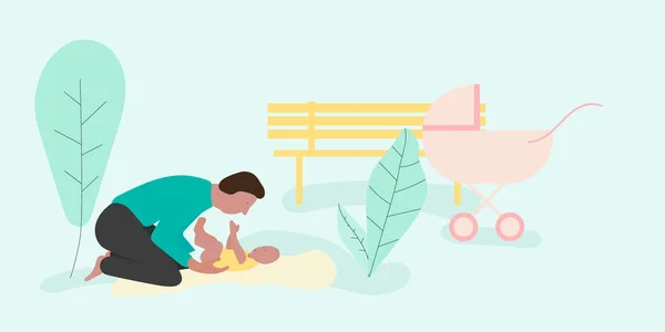 Baba ve oğul parkta oynuyorlar.