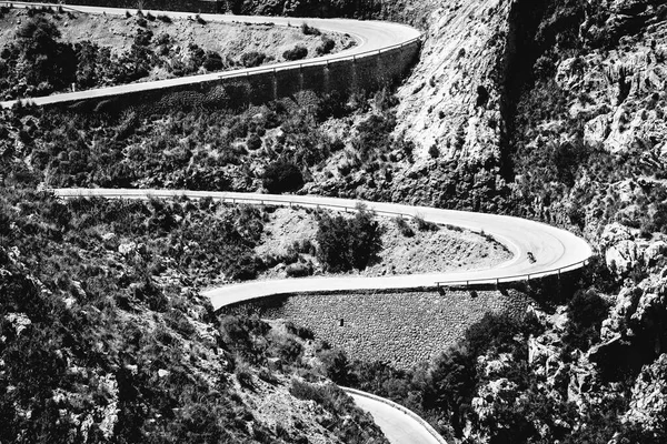 Mountain road curves for cyclist in Mallorca closeup. Outdoors sports landscape