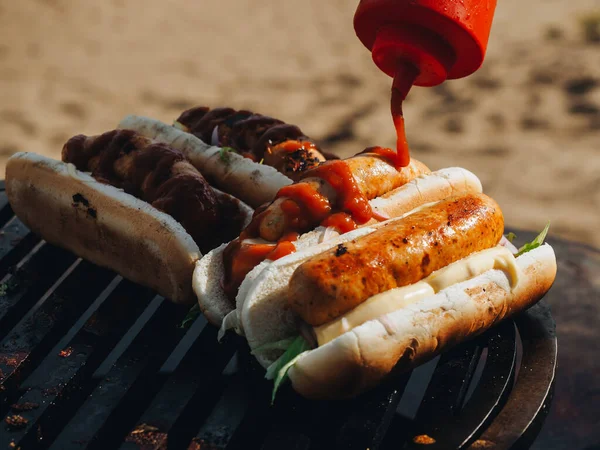 Hot Dogs Bbq Sausages Sauce Buns Greens Street Food — Zdjęcie stockowe