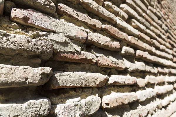 Wall texture of old adobe bricks. Close up