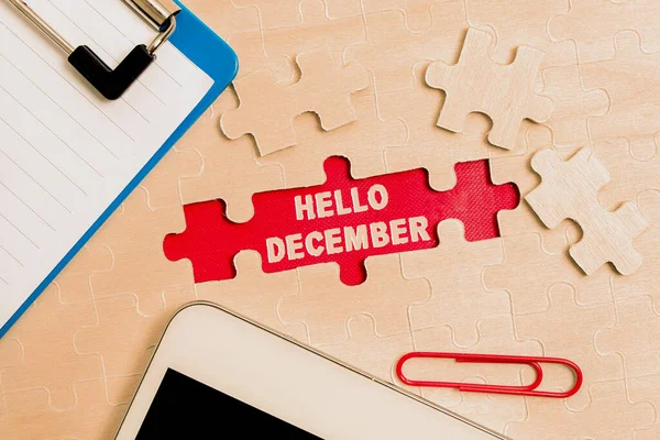 Writing displaying text Hello December. Business showcase greeting used when welcoming the twelfth month of the year Building An Unfinished White Jigsaw Pattern Puzzle With Missing Last Piece — Stock Photo, Image