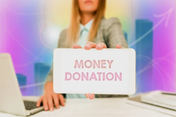 Handwriting text Money Donation. Business showcase a charity aid in a form of cash offered to an association Business Woman Sitting In Office Holding Mobile Displaying Futuristic Ideas. — Foto de Stock