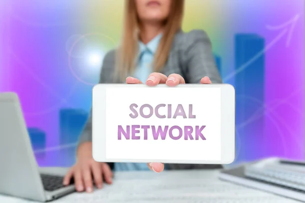 Text caption presenting Social Network. Business overview a framework of individual linked by interan individualal relationship Business Woman Sitting In Office Holding Mobile Displaying Futuristic — Stockfoto