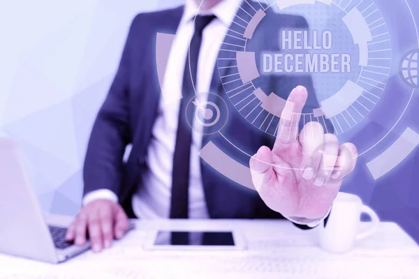 Sinal de escrita da mão Olá Dezembro. Saudação de visão geral de negócios usada ao receber o décimo segundo mês do ano Bussiness Man Sitting Desk Laptop And Phone Pointing Futuristic Technology. — Fotografia de Stock