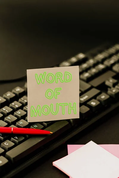 Conceptual caption Word Of Mouth. Business overview information that is transmitted without being written down Converting Written Notes To Digital Data, Typing Important Coding Files Stock Image