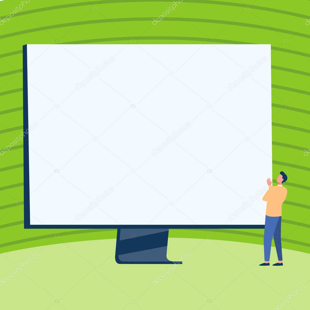 Man Standing Drawing Looking At Large Monitor raising hand Display Presenting. Gentleman Design looks at a big computer Screen Showing New Information.