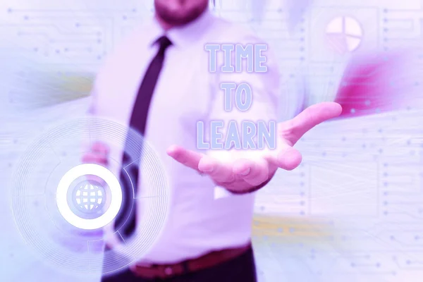 Sign displaying Time To Learn. Word for the need to get knowledge or understanding of facts and ideas Gentelman Uniform Standing Holding New Futuristic Technologies.
