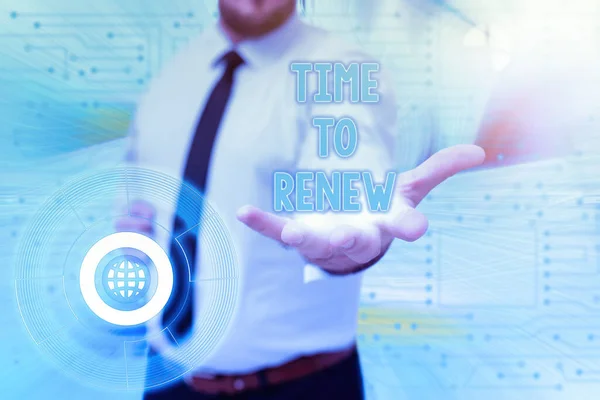 Sign displaying Time To Renew. Business idea extending the period of time when something is valid Gentelman Uniform Standing Holding New Futuristic Technologies.