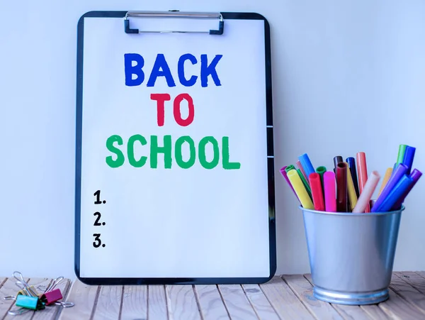 Writing displaying text Back To School. Business showcase is the period relating to the start of a new school year Inspirational business technology concept with copy space — Stock Photo, Image