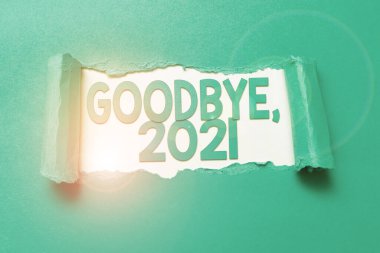 Text showing inspiration Goodbye 2021. Business showcase New Year Eve Milestone Last Month Celebration Transition Tear on sheet reveals background behind the front side clipart