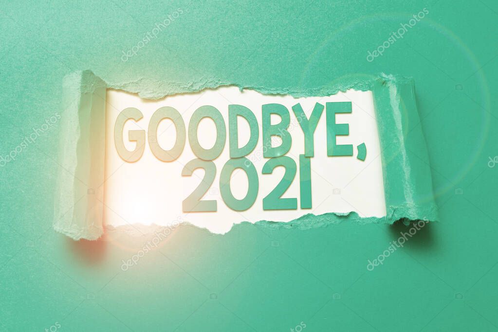 Text showing inspiration Goodbye 2021. Business showcase New Year Eve Milestone Last Month Celebration Transition Tear on sheet reveals background behind the front side