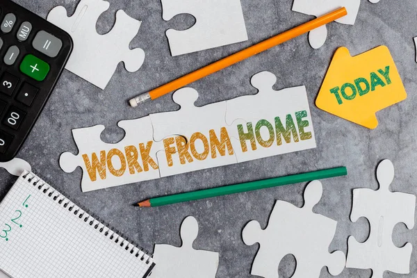 Text sign showing Work From Home. Internet Concept communicating with the company mainly from home flexibly Building An Unfinished White Jigsaw Pattern Puzzle With Missing Last Piece — Stock Photo, Image