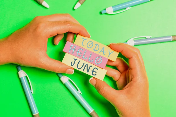 Text showing inspiration Hello June. Concept meaning a new month to plan your activities for fun and adventures Brainstorming Problems And Solutions Asking Relevant Questions