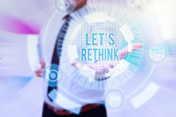 Handwriting text Let S Rethink. Business overview an Afterthought To Remember Reconsider Reevaluate Gentelman Uniform Standing Holding New Futuristic Technologies. — Stock Photo, Image