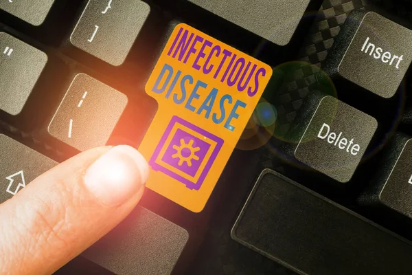 Writing displaying text Infectious Disease. Conceptual photo caused by pathogenic microorganism, such as viruses, etc Typing New Edition Of Informational Ebook, Creating Fresh Website Content