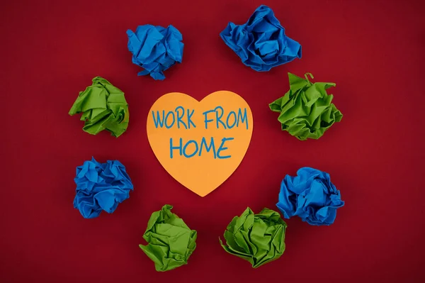 Inspiration showing sign Work From Home. Conceptual photo communicating with the company mainly from home flexibly Colorful Crumpled Papers Circular Pattern Surrounding Heart Shaped Card. — Stock Photo, Image