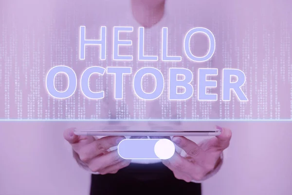 Handschriftlicher Text Hallo Oktober. Business-Konzept Gruß bei der Begrüßung des 10. Monats des Jahres Lady In Uniform Standing Holding Tablet zeigt futuristische Technologien. — Stockfoto