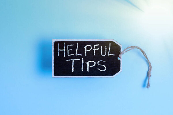 Conceptual caption Helpful Tips. Business concept Ask an Expert Solutions Hints Consulting Warning Collection of Blank Empty Sticker Tags Tied With A String For Information Label Sign