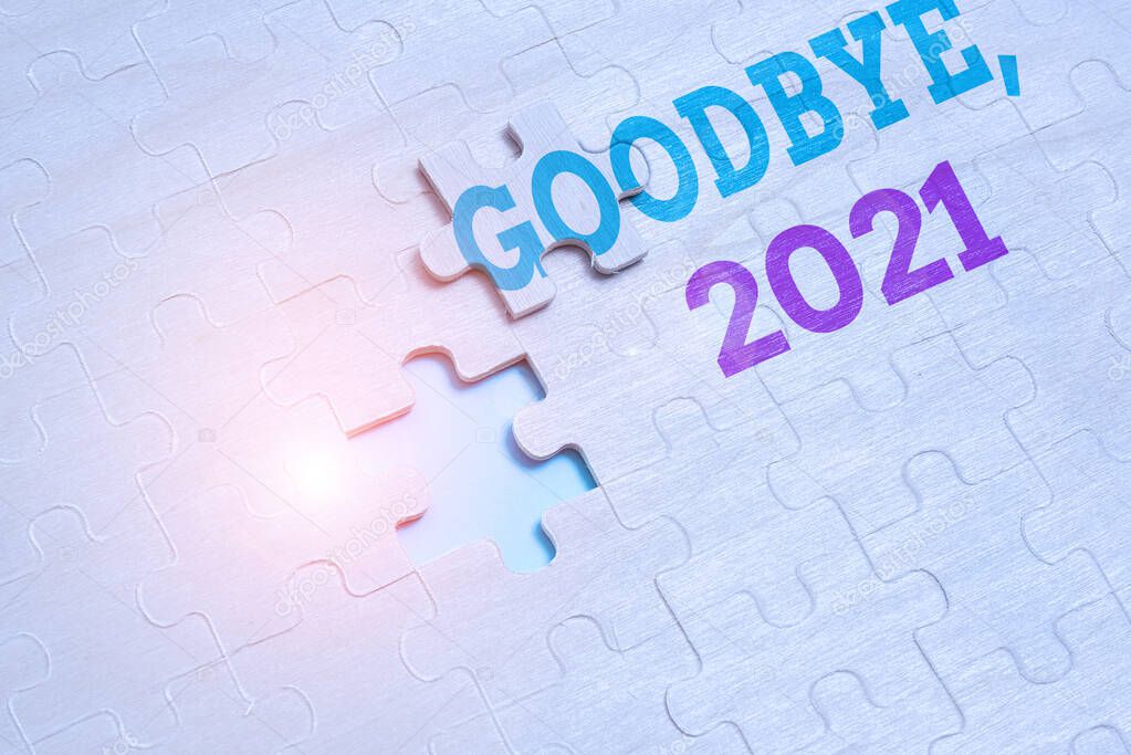 Sign displaying Goodbye 2021. Business concept New Year Eve Milestone Last Month Celebration Transition Building An Unfinished White Jigsaw Pattern Puzzle With Missing Last Piece