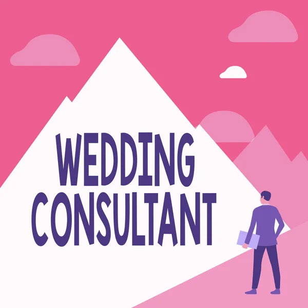 Conceptual caption Wedding Consultant. Idea de negocio alguien planea y coordina la celebración de la boda Caballero en traje de pie que sostiene el cuaderno frente a la alta cordillera. —  Fotos de Stock