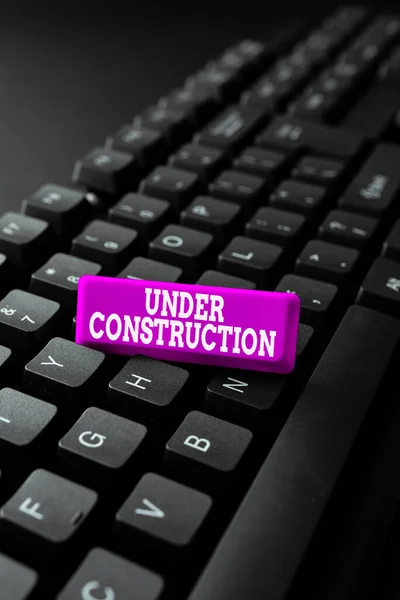 Conceptual caption Under Construction. Business concept project that is unfinished but actively being worked on Entering New Programming Codes, Typing Emotional Short Stories — Foto Stock