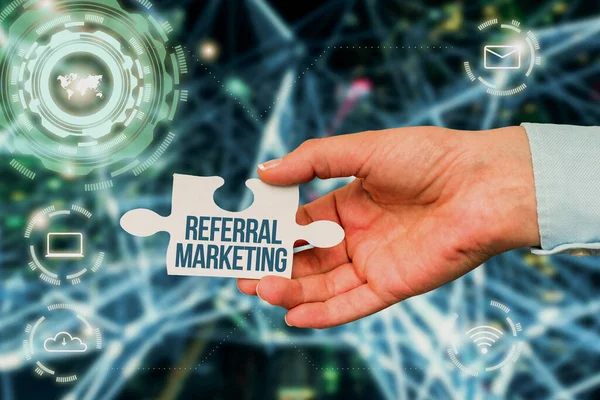 Sign displaying Referral Marketing. Word for the process of leveraging partners and customers Hand Holding Jigsaw Puzzle Piece Unlocking New Futuristic Technologies. — Photo