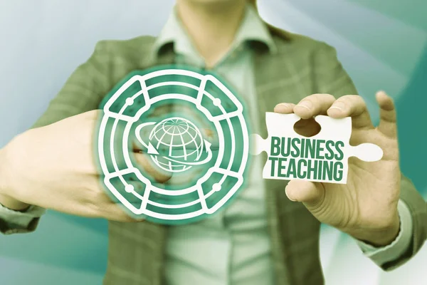 Sign displaying Business Teaching. Internet Concept teaching the skills and operation of the business industry Business Woman Pointing Jigsaw Puzzle Piece Unlocking New Futuristic Tech. — Zdjęcie stockowe