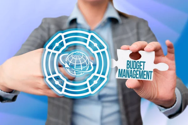 Text caption presenting Budget Management. Word for designing and implementing budget processes of a person Business Woman Pointing Jigsaw Puzzle Piece Unlocking New Futuristic Tech. — Fotografia de Stock