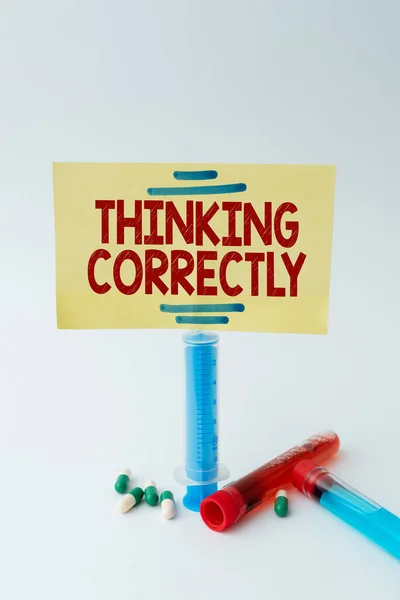 Writing displaying text Thinking Correctly. Word for principle that you think are sensible and morally correct Writing Important Medical Notes Laboratory Testing Of New Infections — Stockfoto