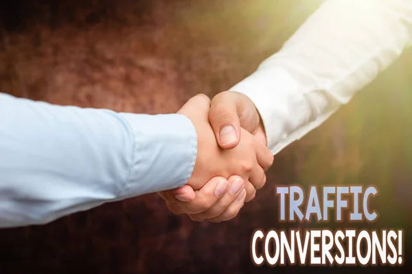 Handwriting text Traffic Conversions. Business approach visitor who has been converted into a client or customer Two Professional Well-Dressed Corporate Businessmen Handshake Indoors — Fotografia de Stock