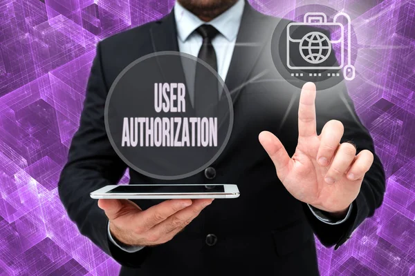 Inspiration showing sign User Authorization. Business showcase security mechanism to determine access levels or user Man In Office Uniform Standing Pressing Virtual Button Holding Tablet. — Fotografia de Stock